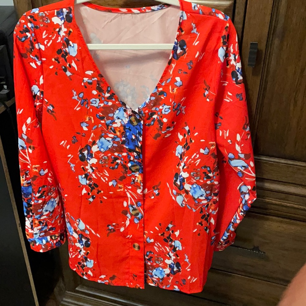 Red long sleeve blouse. Never wear.